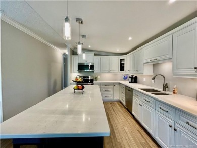 Panoramic view on the Golf Course and Pond! Gorgeous decorating on Indianwood Golf and Country Club in Florida - for sale on GolfHomes.com, golf home, golf lot