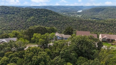 Breathtaking views of Lake Leatherwood and the Ozark Mountains on Holiday Island Executive Golf Course in Arkansas - for sale on GolfHomes.com, golf home, golf lot