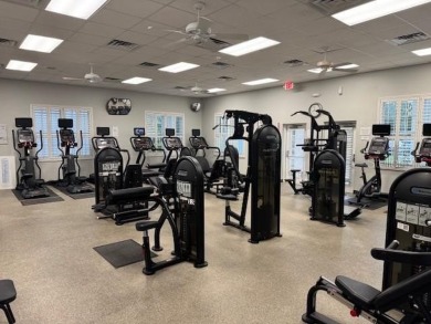 Move-in ready home offers 2 bedrooms, two bathrooms, and a
large on Stonecrest Golf and Club Club in Florida - for sale on GolfHomes.com, golf home, golf lot