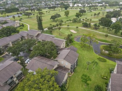 SUPER VALUE 3 bedroom townhome! This private end unit features a on Riverbend Golf Club in Florida - for sale on GolfHomes.com, golf home, golf lot