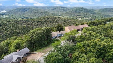 Breathtaking views of Lake Leatherwood and the Ozark Mountains on Holiday Island Executive Golf Course in Arkansas - for sale on GolfHomes.com, golf home, golf lot