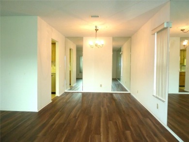 Welcome to your next chapter in one of the most sought-after 55+ on Highland Lakes Executive Golf Course in Florida - for sale on GolfHomes.com, golf home, golf lot