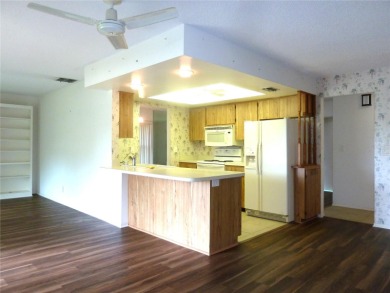 Welcome to your next chapter in one of the most sought-after 55+ on Highland Lakes Executive Golf Course in Florida - for sale on GolfHomes.com, golf home, golf lot