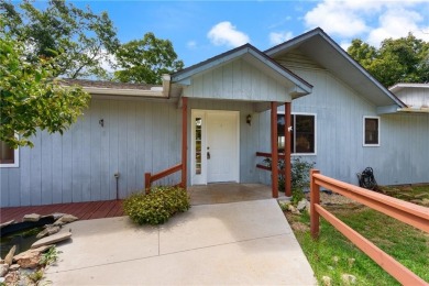 Breathtaking views of Lake Leatherwood and the Ozark Mountains on Holiday Island Executive Golf Course in Arkansas - for sale on GolfHomes.com, golf home, golf lot