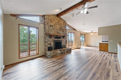 Breathtaking views of Lake Leatherwood and the Ozark Mountains on Holiday Island Executive Golf Course in Arkansas - for sale on GolfHomes.com, golf home, golf lot