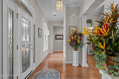 Exquisite custom brick home on a signature golf course with on Brunswick Plantation and Golf Resorts in North Carolina - for sale on GolfHomes.com, golf home, golf lot