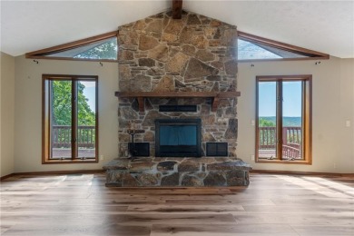 Breathtaking views of Lake Leatherwood and the Ozark Mountains on Holiday Island Executive Golf Course in Arkansas - for sale on GolfHomes.com, golf home, golf lot