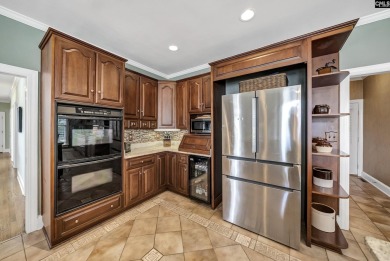 Welcome to 216 Dawn Island Trail, an elegant executive home with on Timberlake Country Club in South Carolina - for sale on GolfHomes.com, golf home, golf lot