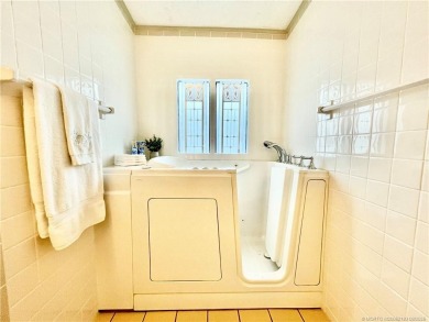 Panoramic view on the Golf Course and Pond! Gorgeous decorating on Indianwood Golf and Country Club in Florida - for sale on GolfHomes.com, golf home, golf lot