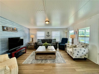 Panoramic view on the Golf Course and Pond! Gorgeous decorating on Indianwood Golf and Country Club in Florida - for sale on GolfHomes.com, golf home, golf lot