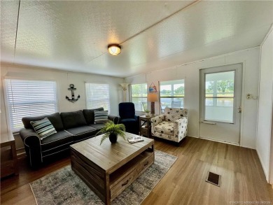 Panoramic view on the Golf Course and Pond! Gorgeous decorating on Indianwood Golf and Country Club in Florida - for sale on GolfHomes.com, golf home, golf lot