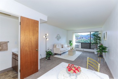 Located in the heart of Aiea, welcome to this spacious 2-bedroom on Pearl Country Club in Hawaii - for sale on GolfHomes.com, golf home, golf lot