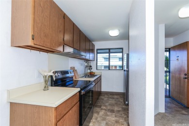 Located in the heart of Aiea, welcome to this spacious 2-bedroom on Pearl Country Club in Hawaii - for sale on GolfHomes.com, golf home, golf lot