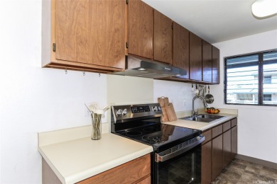 Located in the heart of Aiea, welcome to this spacious 2-bedroom on Pearl Country Club in Hawaii - for sale on GolfHomes.com, golf home, golf lot
