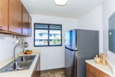 Located in the heart of Aiea, welcome to this spacious 2-bedroom on Pearl Country Club in Hawaii - for sale on GolfHomes.com, golf home, golf lot