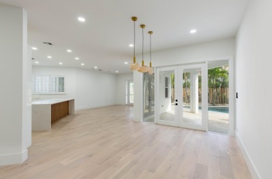 Experience luxury living in this stunning 3-bedroom, 3-bathroom on Palm Beach Polo and Country Club in Florida - for sale on GolfHomes.com, golf home, golf lot