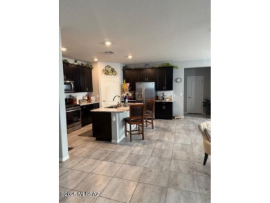 Well cared for home that does not back to other homes.  Granite on Omni Tucson National Golf Resort and Spa - Catalina in Arizona - for sale on GolfHomes.com, golf home, golf lot