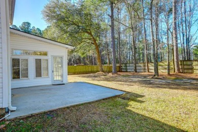 Discover the epitome of Lowcountry living in this elegant on Crowfield Golf and Country Club in South Carolina - for sale on GolfHomes.com, golf home, golf lot