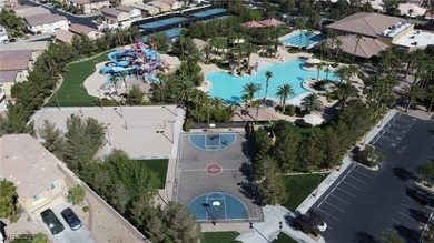 Experience resort-style living in this beautiful single-story on Rhodes Ranch Golf Club in Nevada - for sale on GolfHomes.com, golf home, golf lot