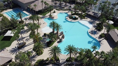 Experience resort-style living in this beautiful single-story on Rhodes Ranch Golf Club in Nevada - for sale on GolfHomes.com, golf home, golf lot