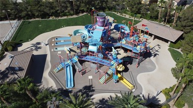 Experience resort-style living in this beautiful single-story on Rhodes Ranch Golf Club in Nevada - for sale on GolfHomes.com, golf home, golf lot