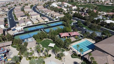 Experience resort-style living in this beautiful single-story on Rhodes Ranch Golf Club in Nevada - for sale on GolfHomes.com, golf home, golf lot