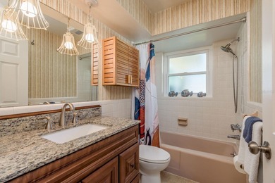 This move-in ready home is perfectly situated between vibrant on The Dunedin Country Club in Florida - for sale on GolfHomes.com, golf home, golf lot