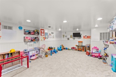 Stunning, fully renovated home featuring dramatic foyer entrance on Southward Ho Country Club in New York - for sale on GolfHomes.com, golf home, golf lot