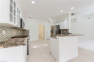 Newly painted and carpeted, this popular Kingfisher model is on Shadow Wood Country Club in Florida - for sale on GolfHomes.com, golf home, golf lot