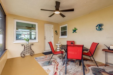 This move-in ready home is perfectly situated between vibrant on The Dunedin Country Club in Florida - for sale on GolfHomes.com, golf home, golf lot