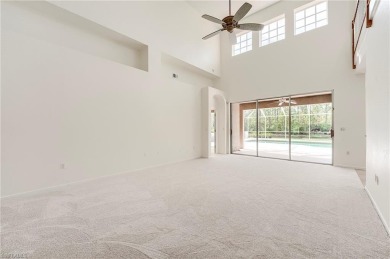 Newly painted and carpeted, this popular Kingfisher model is on Shadow Wood Country Club in Florida - for sale on GolfHomes.com, golf home, golf lot