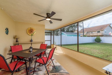 This move-in ready home is perfectly situated between vibrant on The Dunedin Country Club in Florida - for sale on GolfHomes.com, golf home, golf lot