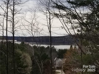 This premium Badin Lake water view lot is located in the on Old North State Club at Uwharrie Point Golf community in North Carolina - for sale on GolfHomes.com, golf home, golf lot