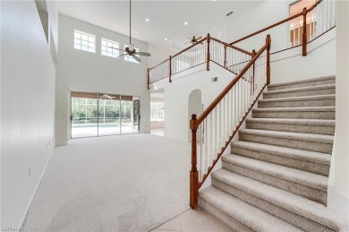 Newly painted and carpeted, this popular Kingfisher model is on Shadow Wood Country Club in Florida - for sale on GolfHomes.com, golf home, golf lot