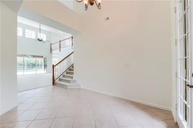 Newly painted and carpeted, this popular Kingfisher model is on Shadow Wood Country Club in Florida - for sale on GolfHomes.com, golf home, golf lot