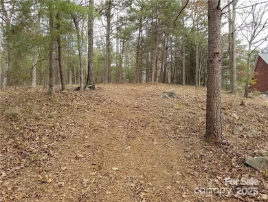 This premium Badin Lake water view lot is located in the on Old North State Club at Uwharrie Point Golf community in North Carolina - for sale on GolfHomes.com, golf home, golf lot