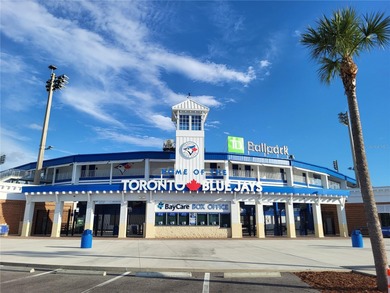 Under contract-accepting backup offers. This move-in ready home on The Dunedin Country Club in Florida - for sale on GolfHomes.com, golf home, golf lot