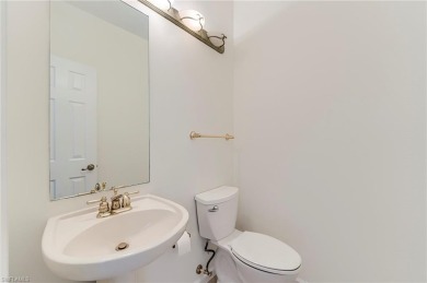 Newly painted and carpeted, this popular Kingfisher model is on Shadow Wood Country Club in Florida - for sale on GolfHomes.com, golf home, golf lot