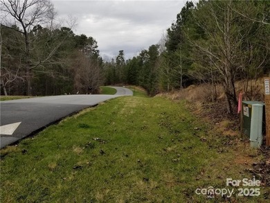 This premium Badin Lake water view lot is located in the on Old North State Club at Uwharrie Point Golf community in North Carolina - for sale on GolfHomes.com, golf home, golf lot