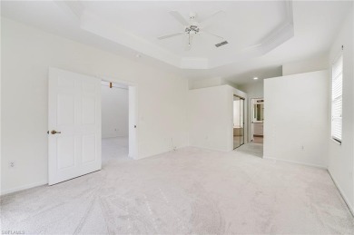 Newly painted and carpeted, this popular Kingfisher model is on Shadow Wood Country Club in Florida - for sale on GolfHomes.com, golf home, golf lot