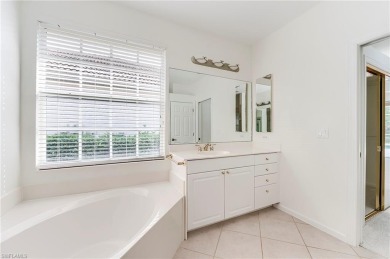Newly painted and carpeted, this popular Kingfisher model is on Shadow Wood Country Club in Florida - for sale on GolfHomes.com, golf home, golf lot