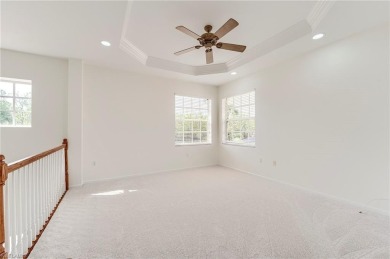 Newly painted and carpeted, this popular Kingfisher model is on Shadow Wood Country Club in Florida - for sale on GolfHomes.com, golf home, golf lot