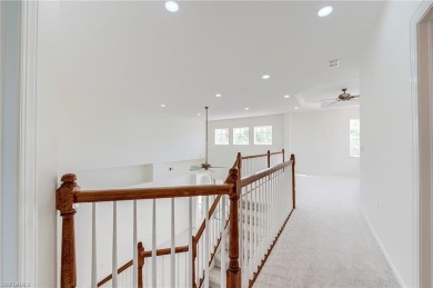 Newly painted and carpeted, this popular Kingfisher model is on Shadow Wood Country Club in Florida - for sale on GolfHomes.com, golf home, golf lot