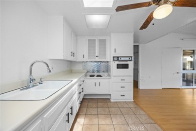 Come and view this bright and inviting south-facing 2 bedrooms,1 on Leisure World Seal Beach Golf Course in California - for sale on GolfHomes.com, golf home, golf lot
