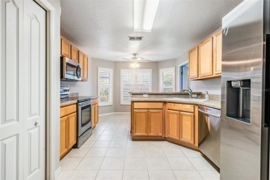 MOVE-IN READY and METICULOUSLY MAINTAINED home in the highly on Tampa Bay Golf and Country Club in Florida - for sale on GolfHomes.com, golf home, golf lot