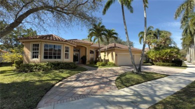 Located in the exclusive community of Weston Hills, this on Weston Hills Country Club in Florida - for sale on GolfHomes.com, golf home, golf lot