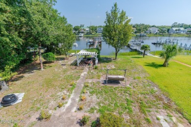 Discover the ultimate coastal living experience on this prime on Founders Club At St. James Plantation in North Carolina - for sale on GolfHomes.com, golf home, golf lot