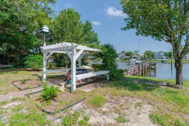 Discover the ultimate coastal living experience on this prime on Founders Club At St. James Plantation in North Carolina - for sale on GolfHomes.com, golf home, golf lot