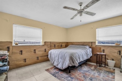 INVESTMENT OPPORTUNITY - Property was impacted by Hurricane on Mangrove Bay Golf Course in Florida - for sale on GolfHomes.com, golf home, golf lot