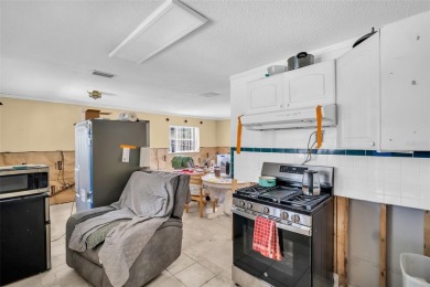 INVESTMENT OPPORTUNITY - Property was impacted by Hurricane on Mangrove Bay Golf Course in Florida - for sale on GolfHomes.com, golf home, golf lot